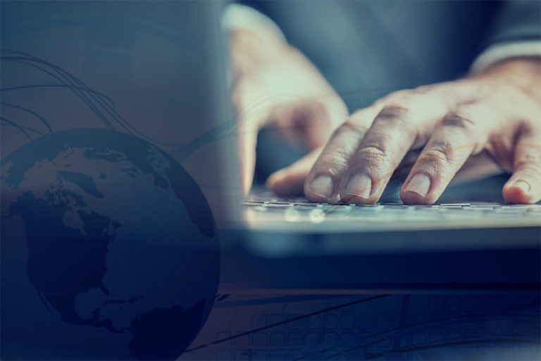 hands on a keyboard on a laptop