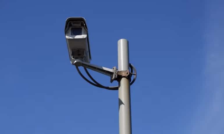 a Video Surveillance camera on a pole outside